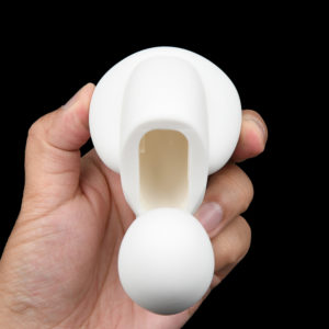 The large head that fits and pressures your G-spot; it also keeps the body stay in one place, allowing the rotating parts to lick your vulva endlessly.