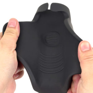 Opening the wrap-around fin part reveals quadruple folds in front of the contact surface, providing enjoyable frictional stimulation. The round part above is the rotor.